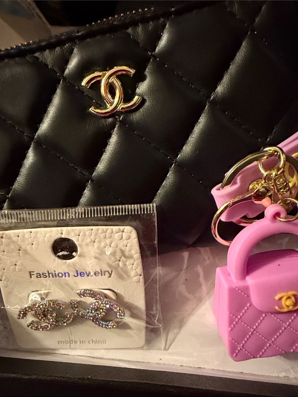 Change purse with earrings and keychain